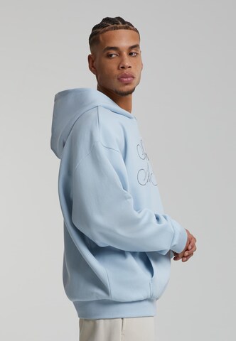 Sweat-shirt Karl Kani en bleu