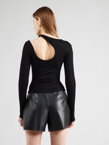 ABOUT YOU T-shirt 'Leandra' i svart