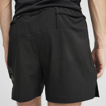 Regular Pantalon de sport 'Seasons' PUMA en noir