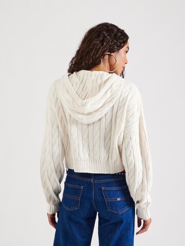 Pull-over Tommy Jeans en blanc