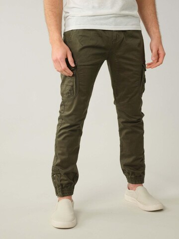 Deeluxe Tapered Hose 'Garden' in Grün: Vorderseite