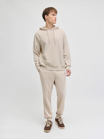 JJ Rebel Дънки Tapered Leg Панталон 'JREBROCKY' в бежово