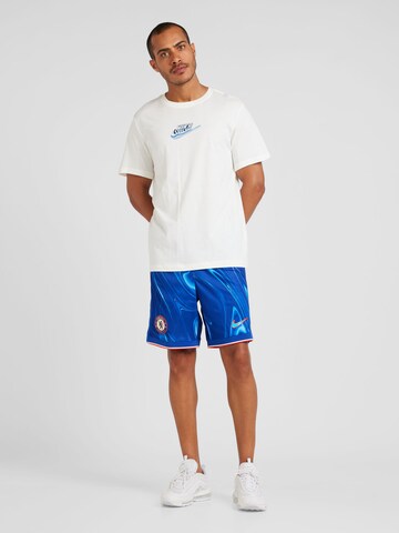 NIKE Slim fit Workout Pants 'CFC STAD' in Blue