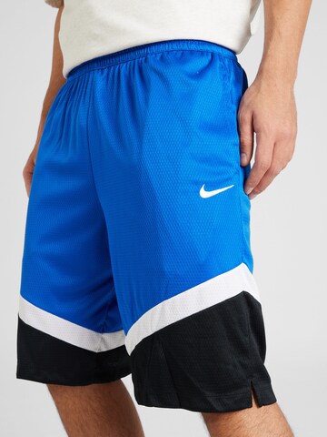 NIKE Regular Sports trousers in Blue