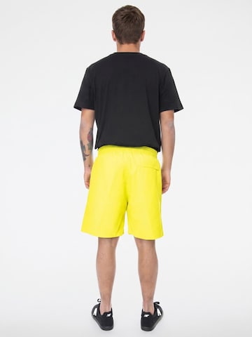 ADIDAS Baggy Hose‌‌‌‌‌ in Gelb