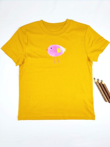 MelaDi Shirt 'Lila Vogel'‌‌‌‌‌‌‌‌‌‌ in Gelb