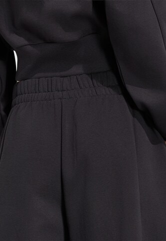 ADIDAS SPORTSWEAR Barrel Sports trousers 'Essentials Contemporary' in Black