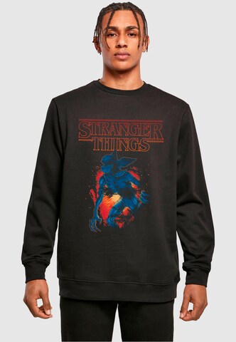 ABSOLUTE CULT Sweatshirt ' Stranger Things' in Schwarz: Vorderseite