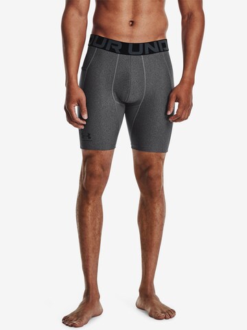 UNDER ARMOUR Skinny Sportbroek in Grijs: voorkant