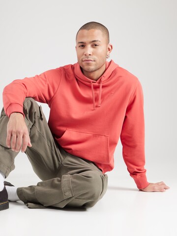 Champion Authentic Athletic Apparel Sweatshirt in Red: front