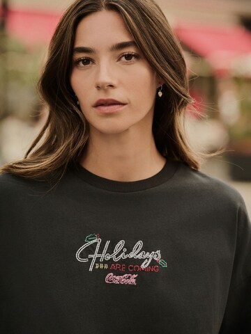 Next T-Shirt 'Coca Cola' in Schwarz