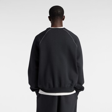 Sweat-shirt 'Trackside' new balance en noir