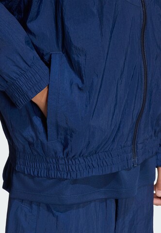 ADIDAS ORIGINALS Tussenjas in Blauw
