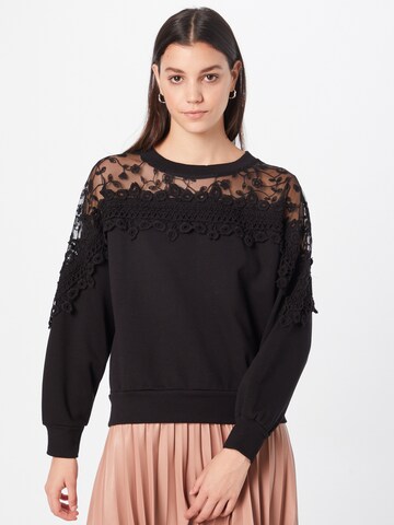 Cream Sweatshirt 'Kalanie' in Schwarz: predná strana