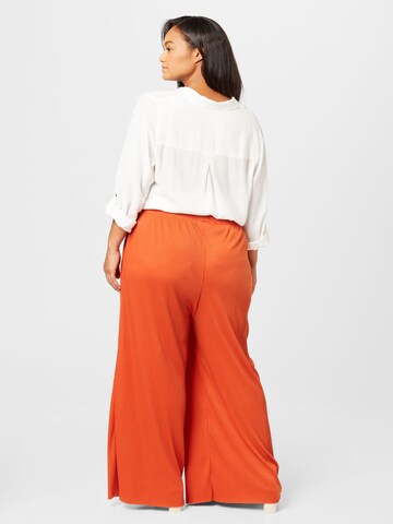 ABOUT YOU Curvy Loosefit Broek 'Dion' in Oranje