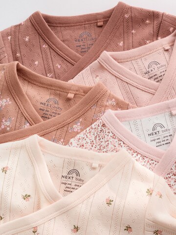 Next - Pijama entero/body en rosa