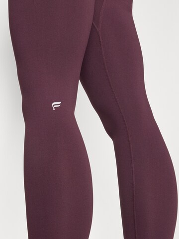 Fabletics Skinny Fit Спортен панталон в червено