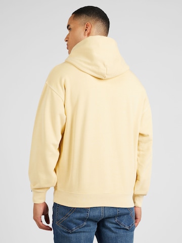 LEVI'S ®Sweater majica 'Red Tab Sweats Hoodie' - žuta boja