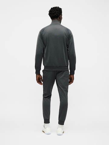 ADIDAS ORIGINALS Jogging ruhák 'TECH ESS' - szürke
