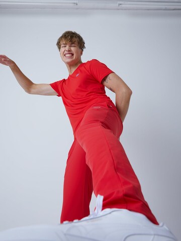 Coupe slim Pantalon de sport 'Slim Training Pants' SPORTKIND en rouge