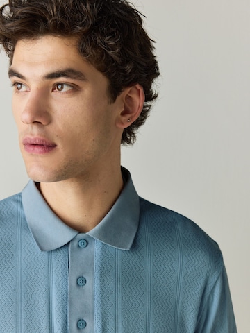 Tricou de la Next pe albastru