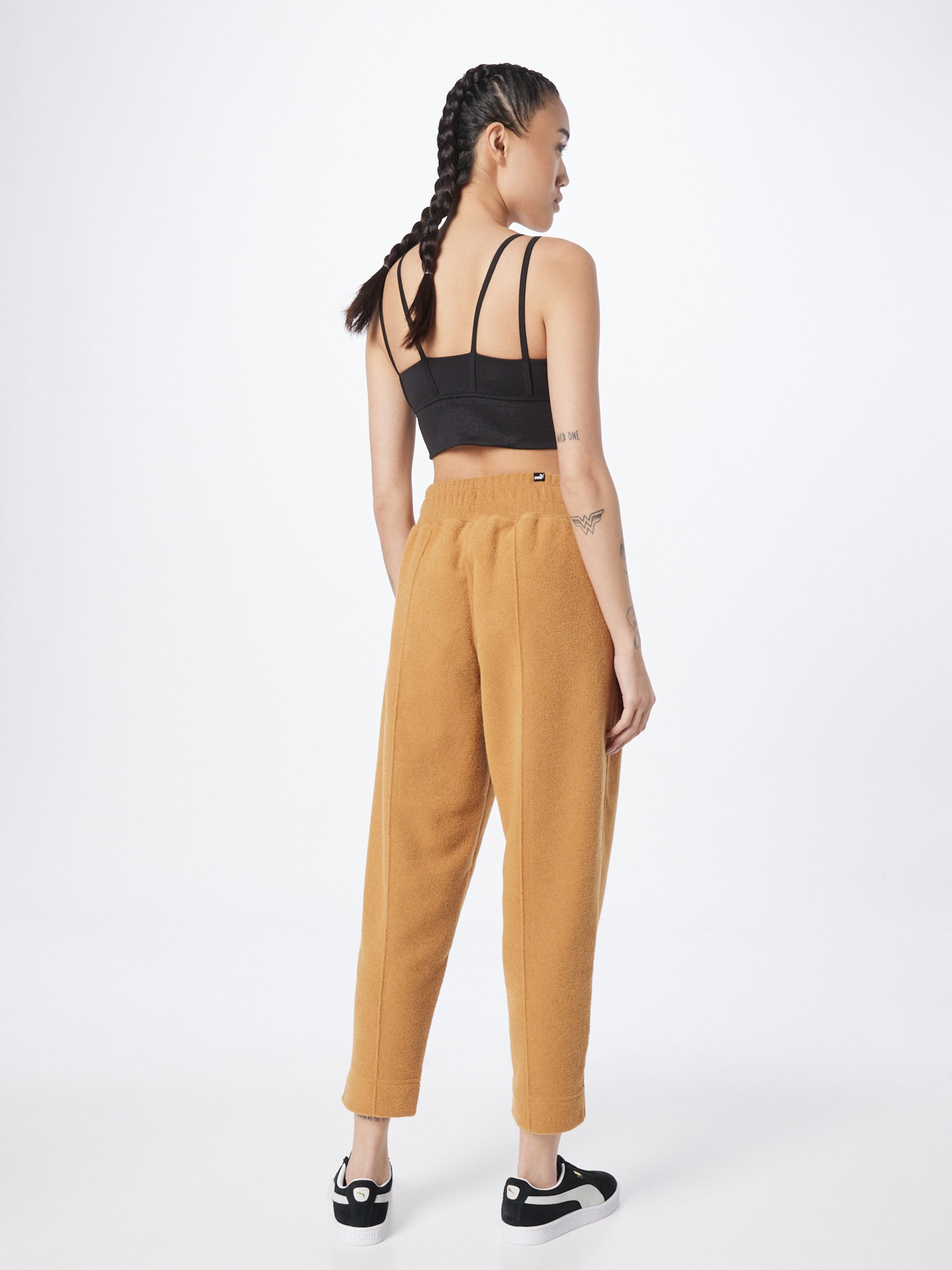 Pantaloni puma marrone top