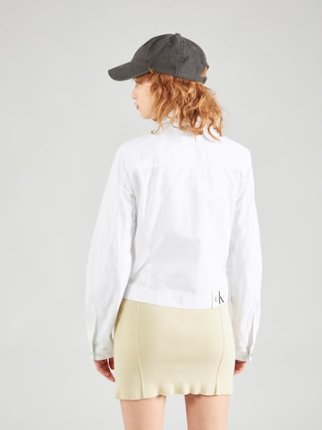 Calvin Klein Jeans Преходно яке 'LEAN' в бяло