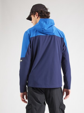 Veste de sport UNDER ARMOUR en bleu