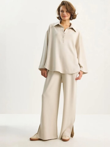 Completo pantalone di Bianco Lucci in beige: frontale