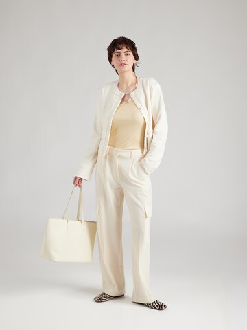 Haut 'Babette' rosemunde en jaune