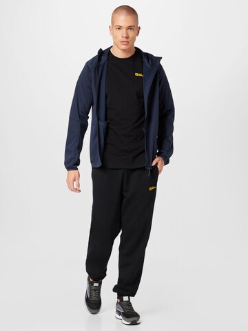 JACK WOLFSKIN Sportshirt 'ESSENTIAL' in Schwarz