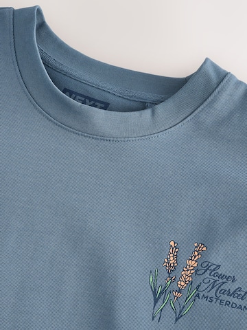 Tricou de la Next pe albastru