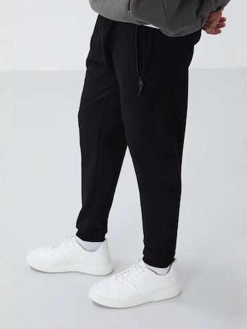 Regular Pantalon de sport Tommy Life en noir