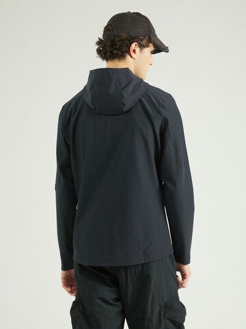 Veste de sport UNDER ARMOUR en noir