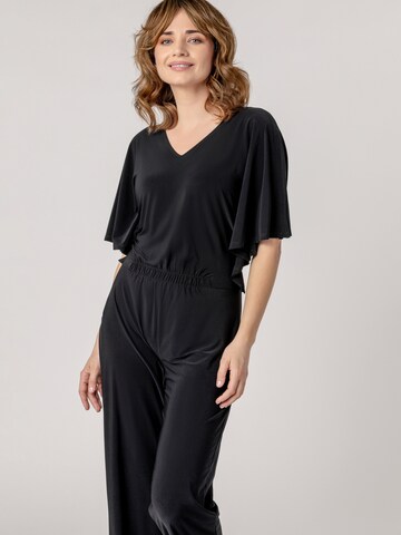 Tuta jumpsuit '3US001' di Quiosque in nero: frontale
