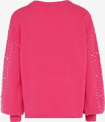 Pullover di faina in rosa