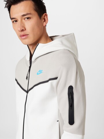 Nike Sportswear - Casaco em moletão em cinzento