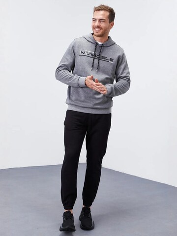 Sweat-shirt Tommy Life en gris