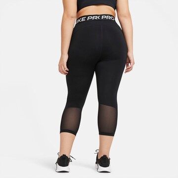 NIKE Skinny Spodnie sportowe w kolorze czarny