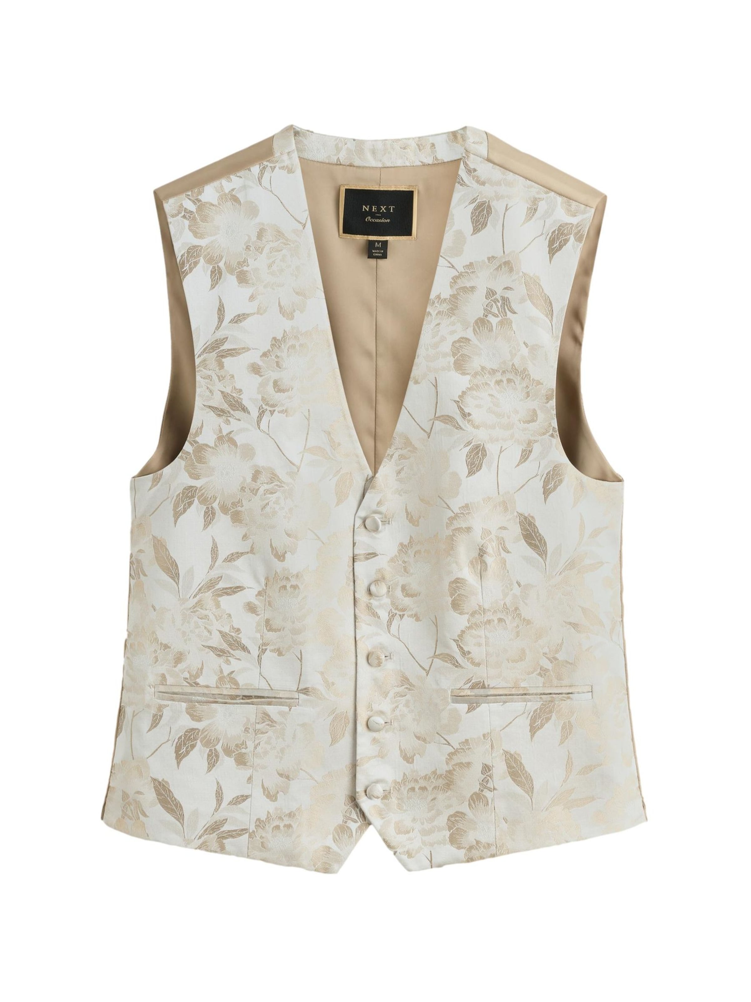 Vestă de la Next pe bej: față