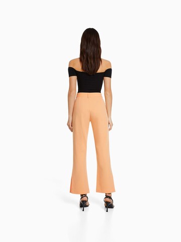 Bershka Flared Broek in Oranje