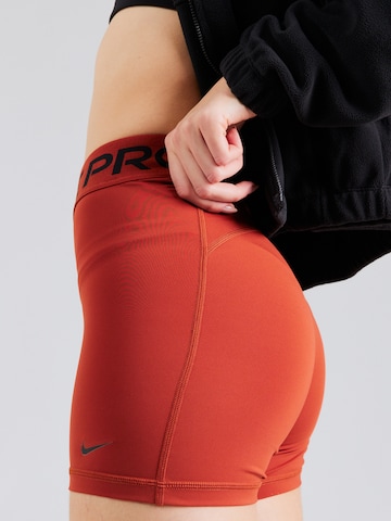 NIKE Скинни Спортивные штаны 'Pro 365' в Оранжевый