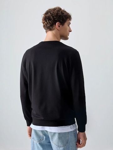 Sweat-shirt Tommy Life en noir
