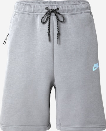 Nike Sportswear Lużny krój Spodnie 'TECH FLC' w kolorze szary: przód