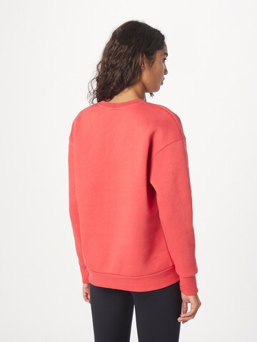 UNDER ARMOUR Sport sweatshirt 'Essential' i röd