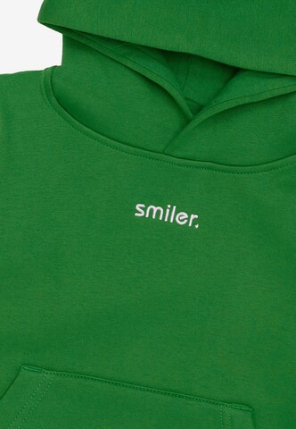 Sweat smiler. en vert