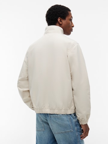Tommy Jeans Between-season jacket 'ESSENTIAL' in Beige