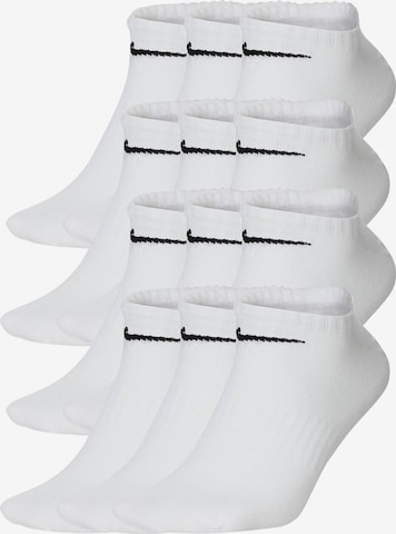 NIKE Athletic Socks in White: front