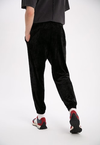 Loosefit Pantaloni di ET Nos in nero