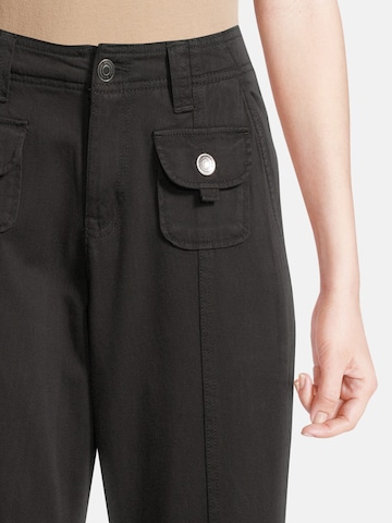 Flared Pantaloni di AÉROPOSTALE in nero